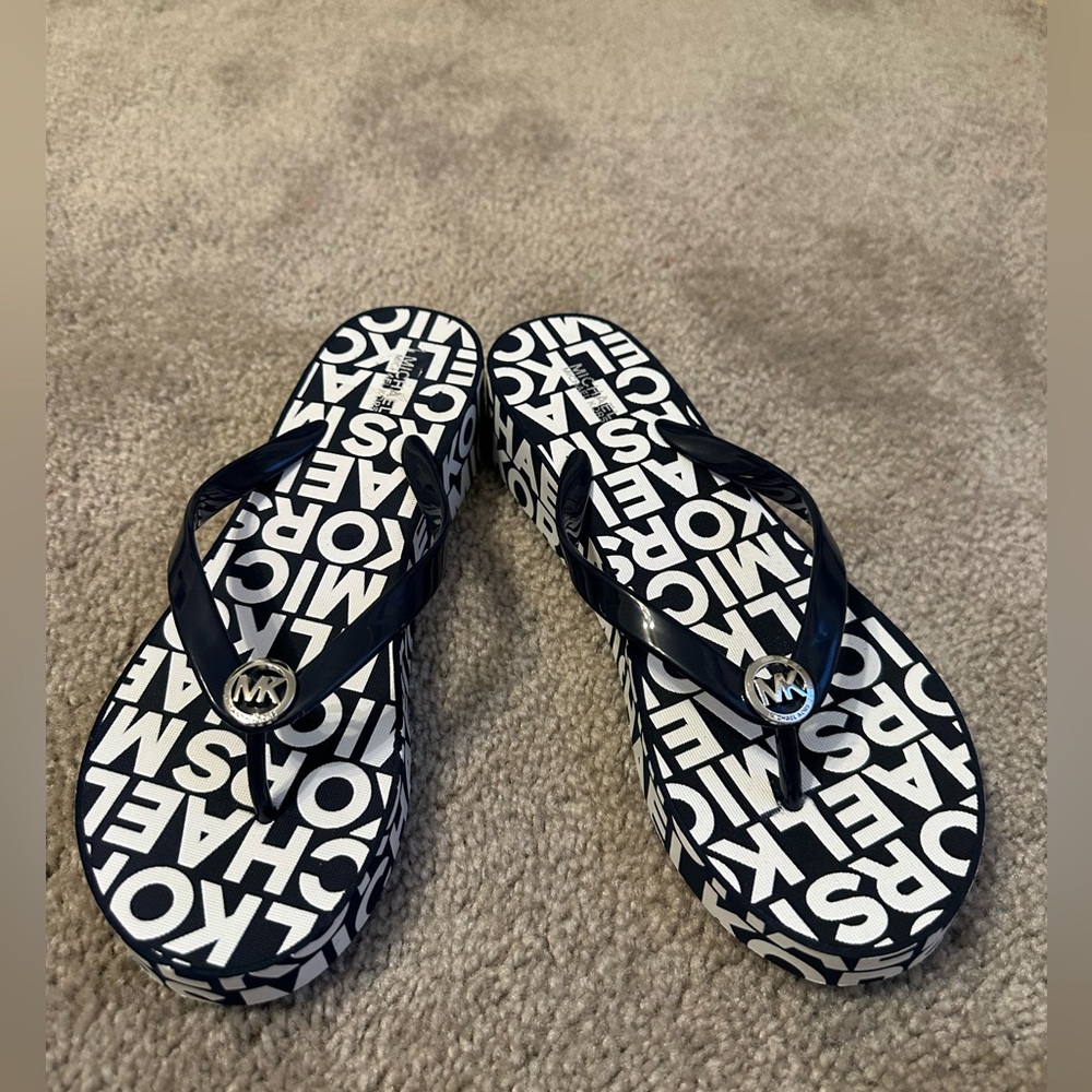 Michael Kors blue and white flip flops